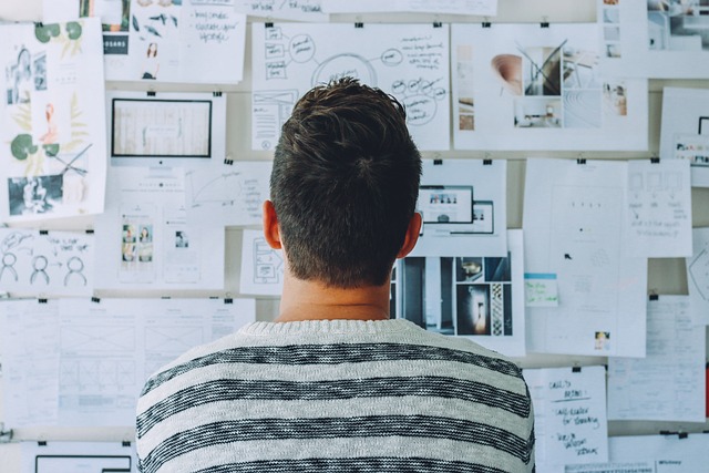 Blog Image Man looking at Taskboard